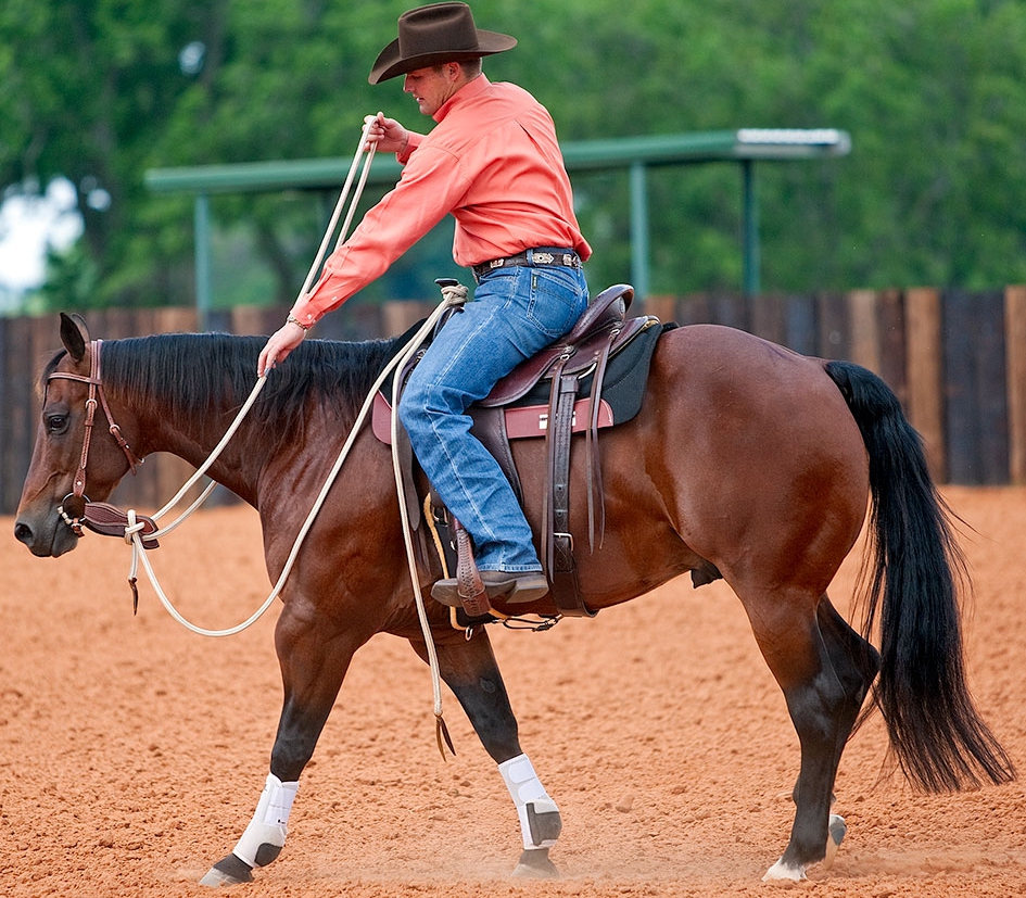 Slide hand down and stay sitting back in the saddle.